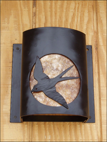 swallow sconce